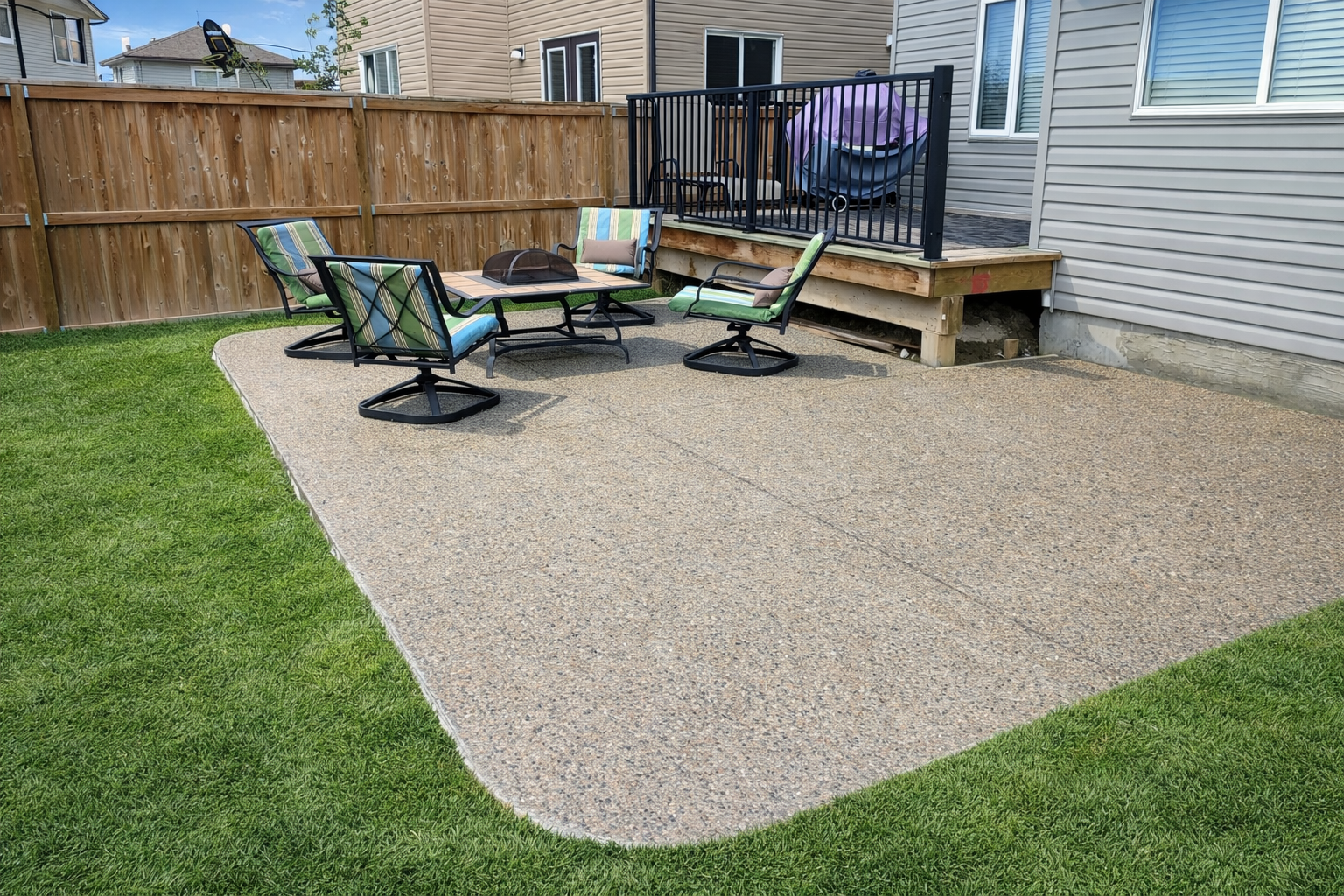 Professional exposed aggregate concrete patio showcasing expert concrete finishing work in Calgary